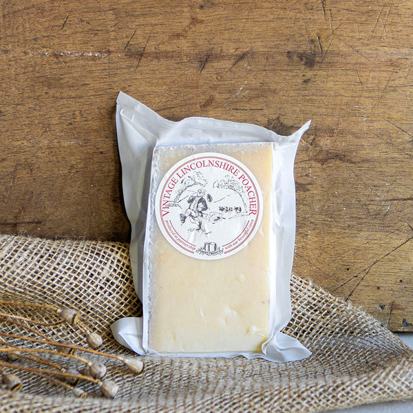 Lincolnshire Poacher is the beautiful love-child of a West Country Cheddar and an Alpine hard cheese, combining the very best elements of both. A hard cow’s milk cheese, it was developed by 4th generation farming brothers Simon and Tim Jones, and is now made by their head cheesemaker Richard, on their idyllic dairy farm on the edge of the Lincolnshire Wolds.