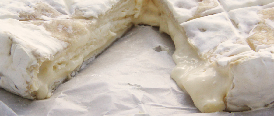 Our baron bigod brie oozing gently onto the wax wrapper